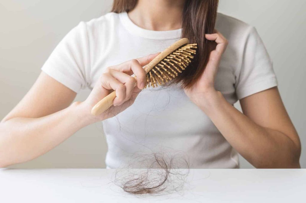 Woman Experiencing Hair Thinning - Papilla by Kim Lim